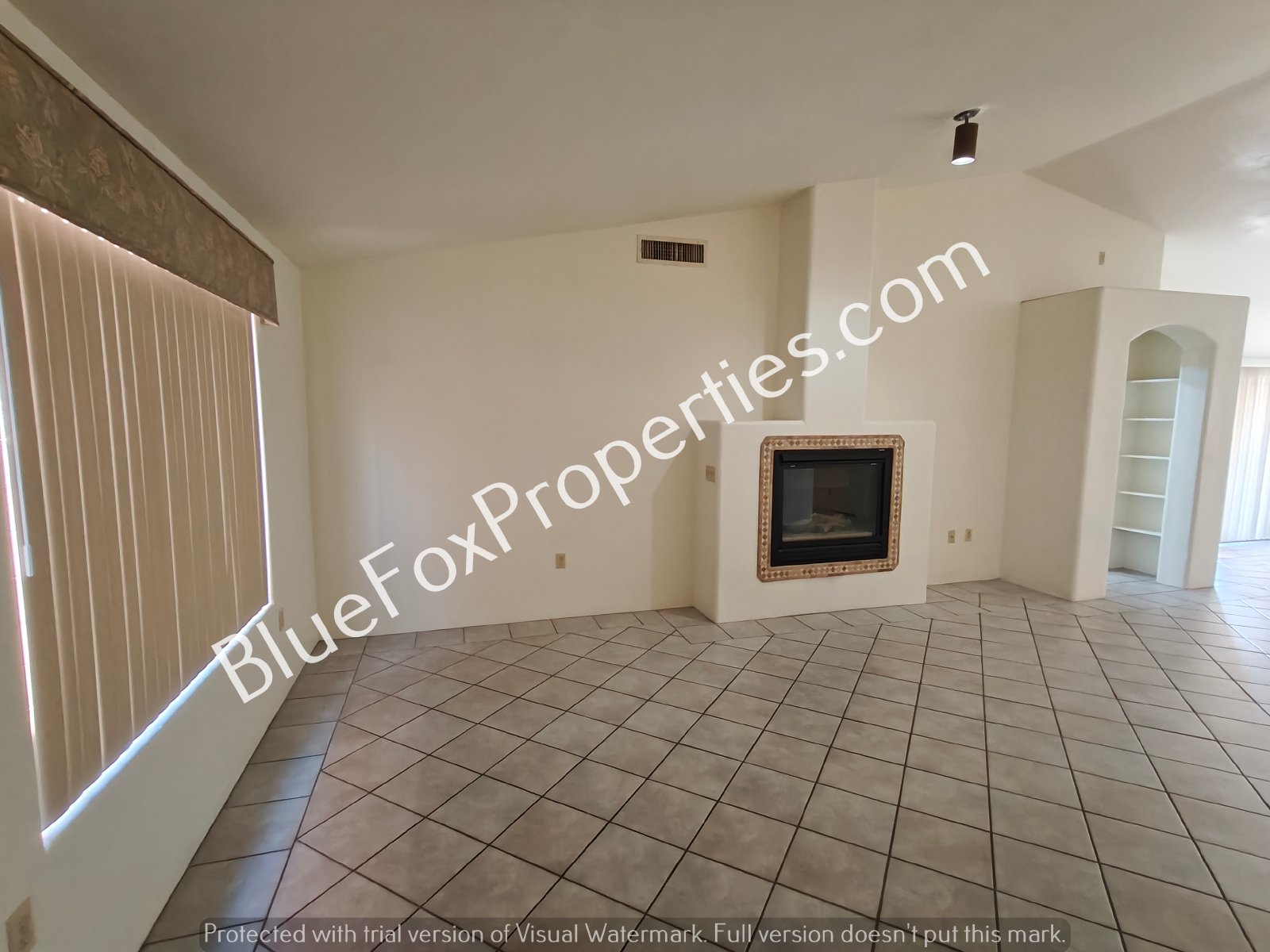 Beautiful home with two fireplaces, stunning archways and an open living area! property image