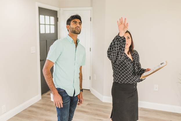 A person and person standing in a room